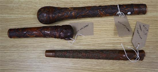 Three Japanese carved bamboo cane handles, Meiji period